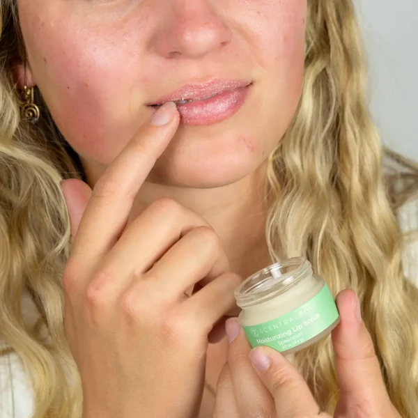 Application of moisturizing lip scrub