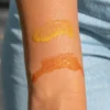 shimmer oils on arm