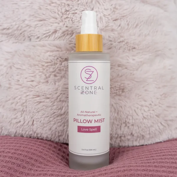 Scentral Zone's Love Spell Pillow Mist on a bed with pillow